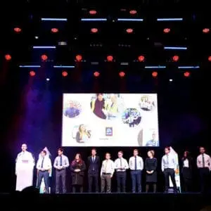 Business team event photography corporate building photo shoot on stage indigio o2